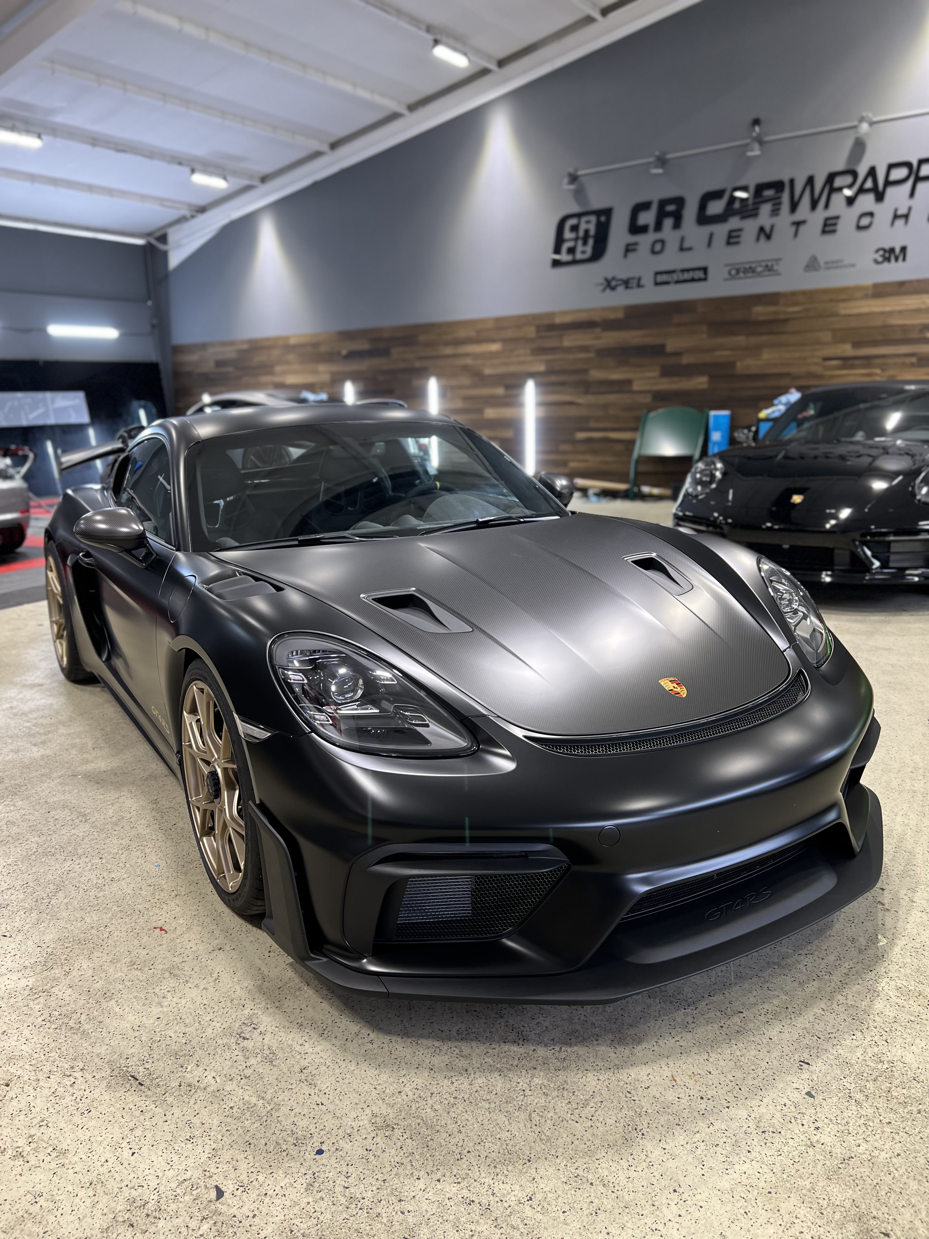 Porsche Cayman GT4 RS XPEL Stealth Lackschutz Komplettfolierung